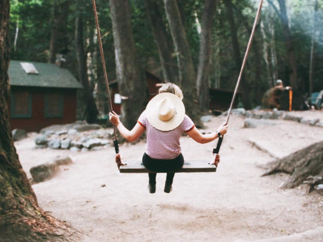 Woman Enjoying the Big Swing at Sturtevant Camp